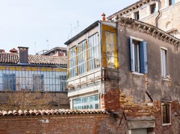 travel to Italy - living houses in residential quarter on square campo san severo of Venice city in spring