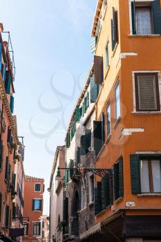 travel to Italy - residential houses on street calle del Mondo Novo in Venice city in spring