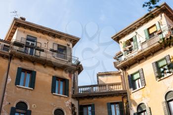 travel to Italy - urban houses on street Calle di Mezzo in Venice city in spring