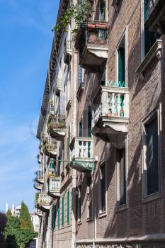 travel to Italy - facade of apartment house in Santa Croce district in Venice city in spring