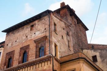 travel to Italy - medieval palace Casa del Mercante (Casa di Boniforte da Concorezzo) on Piazza Erbe in Mantua city in spring