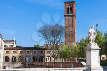 travel to Italy - view of statue on piazza martiri di belfiore and Campanile di San Domenico Mantua city in spring