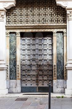 travel to Italy - decorated medieval door in Padua city in spring