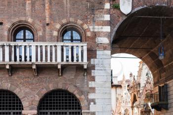 travel to Italy - arch in palazzo del podesta on piazza dei signori in Verona city in spring