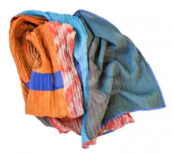 rumpled stitched patchwork scarf from batik and painted silk fabric pieces isolated on white background