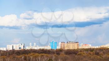 Moscow skyline with urban park in early spring day