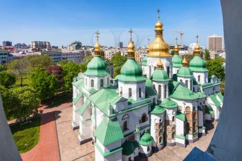 travel to Ukraine - above view of building of Saint Sophia (Holy Sophia, Hagia Sophia) Cathedral from bell tower in Kiev city in spring
