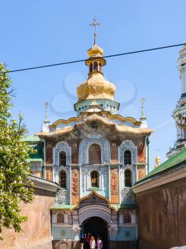 KIEV, UKRAINE - MAY 5, 2017: visitors near entrance in Kiev Pechersk Lavra, Gate Church of the Trinity (Pechersk Lavra). This Church was built in 1106-1108 atop the main entrance to the monastery