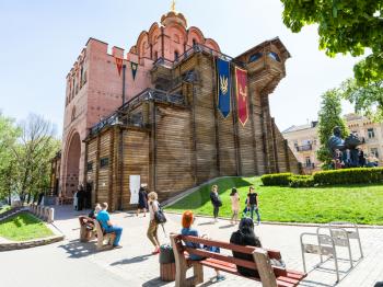 KIEV, UKRAINE - MAY 5, 2017: people near Golden Gate Monument (Golden Gates of Kiev) in Kyiv city. The Golden Gates were built in 1017-1024, the modern gates was completely rebuilt by in 1982