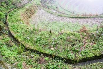 travel to China - view of wet rice terraced fieilds from viewpoint Music from Paradise in area of Dazhai Longsheng Rice Terraces (Dragon's Backbone terrace, Longji Rice Terraces) country in spring