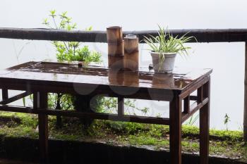 travel to China - wet table on terrace in Tiantouzhai village in spring rain in area of Dazhai Longsheng Rice Terraces (Dragon's Backbone terrace, Longji Rice Terraces)