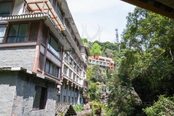 travel to China - facades of apartment houses in Jiangdi village in Longsheng Hot Springs National Forest Park of Xiangshan District in spring season