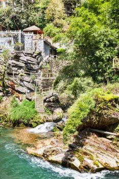 travel to China - waterfront of mountain creek in Longsheng Hot Springs National Forest Park in Jiangdi village of Xiangshan District in spring season