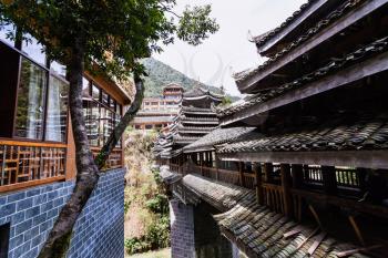 travel to China - houses and Dong people style bridge in Longsheng Hot Springs National Forest Park in Jiangdi village of Xiangshan District in spring season