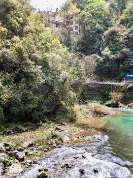 travel to China - creek in Jiangdi village in area of Longsheng Hot Springs National Forest Park of Xiangshan District in spring season