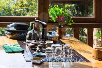 travel to China - empty dish on table in chinese eatery in Chengyang village of Sanjiang Dong Autonomous County in spring morning