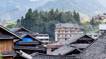 travel to China - roofs of country houses in Chengyang village in Sanjiang Dong people Autonomous County in spring season