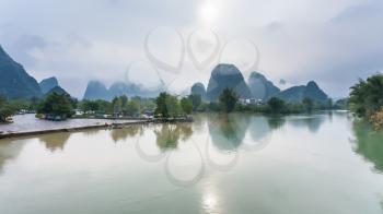 travel to China - panormic view of Yulong and Jinbao rivers and karst mountains in Yangshuo County in spring season