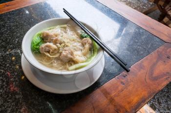 travel to China - Dim sum with noodle soup in chinese cafe in Yangshuo town County