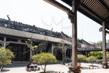GUANGZHOU, CHINA - APRIL 1, 2017: people in court of Chen Clan Ancestral Hall academic temple (Guangdong Folk Art Museum) in Guangzhou. The house was prepared for the imperial examinations in 1894