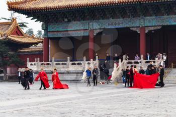BEIJING, CHINA - MARCH 19, 2017: visitors on courtyard of Imperial Ancestral Temple (Taimiao, Working People's Cultural Palace) in Beijing Imperial city in spring. The first Hall was built in 1420