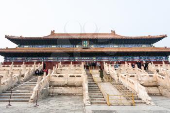 BEIJING, CHINA - MARCH 19, 2017: tourists near facade of Imperial Ancestral Temple (Taimiao, Working People's Cultural Palace) in Beijing Imperial city in spring. The first Hall was built in 1420
