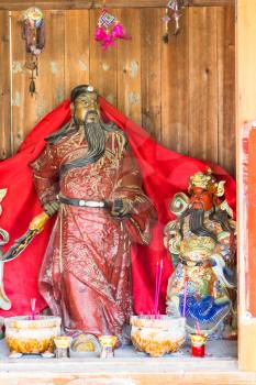 CHENGYANG, CHINA - MARCH 27, 2017: religious figures in Chengyang village of Sanjiang Dong Autonomous County in spring. Chengyang includes eight villages of the Dong people