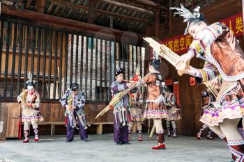 CHENGYANG, CHINA - MARCH 27, 2017: musicians in Dong Culture Show on square of Folk Custom Centre of Chengyang village of Sanjiang County in spring. Chengyang includes eight villages of Dong people