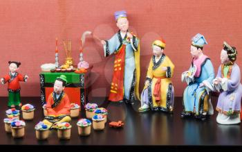 GUANGZHOU, CHINA - MARCH 31, 2017: Porcelain figurines in Chen Clan Ancestral Hall (Guangdong Folk Art Museum) in Guangzhou city. The house was prepared for imperial examinations in 1894