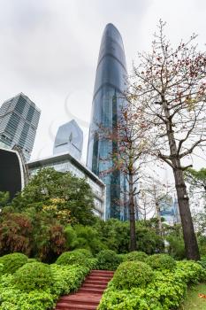 GUANGZHOU, CHINA - MARCH 31, 2017: skyscrapers over Zhujiang Park in Zhujiang New Town of Guangzhou city in spring. Guangzhou is the third most-populous city in China with population about 13,5 mln