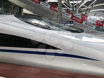 CHANGSHA, CHINA - MARCH 21, 2017: high-speed train in railway station in Changsha city. Changsha is the capital of Hunan province, city has about 7 mln residents