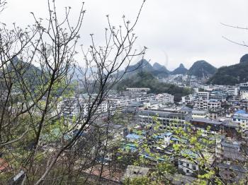 GUILIN, CHINA - MARCH 22, 2017: above view of Guilin city from The Solitary Beauty Hill in spring. The city is in the northeast of China's Guangxi Zhuang Region, there are about 4,8 mln inhabitants