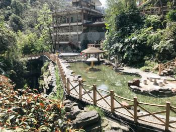 JIANGDI, CHINA - MARCH 26, 2017: area with warm water from hot springs in spa hotel in Jiangdi village in resort district Longsheng Hot Springs National Forest Park of Xiangshan District