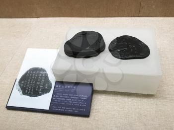 GUANGZHOU, CHINA - MARCH 31, 2017: ancient inkstone in Chen Clan Ancestral Hall (Guangdong Folk Art Museum) in Guangzhou city. The house was prepared for imperial examinations in 1894