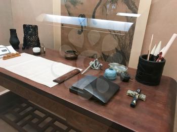 GUANGZHOU, CHINA - MARCH 31, 2017: clerk's desk in interior of Chen Clan Ancestral Hall (Guangdong Folk Art Museum) in Guangzhou city. The house was prepared for imperial examinations in 1894