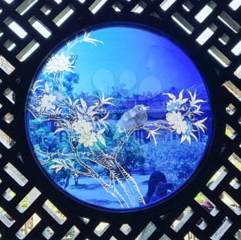 GUANGZHOU, CHINA - APRIL 1, 2017: decorated window in Chen Clan Ancestral Hall (Guangdong Folk Art Museum) in Guangzhou city. The house was prepared for imperial examinations in 1894