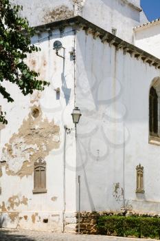 Travel to Algarve Portugal - white walls of Church of Santiago (Igreja matriz de Santiago) in Tavira city