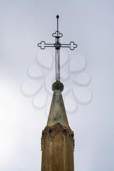 Travel to Provence, France - Cross on spire of tower of franciscan medieval Monastere de Cimiez in Nice city