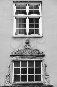 travel to Latvia - ornamental windows of medieva house on Tirgonu Iela street in Riga city in autumn