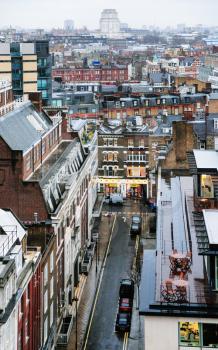 above view of street in residential district of London city in rainy winter day