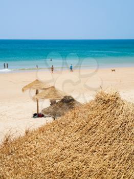 Travel to Algarve Portugal - sand beach Praia da Mareta of Atlantic Ocean in Sagres town