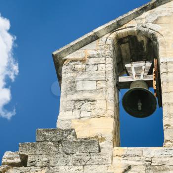 Travel to Provence, France - bell in bell tower of cathedral in Palais des Papes (Papal palace) in Avignon city