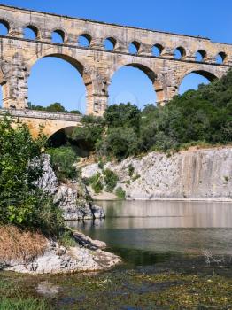 Travel to Provence, France - ancient Roman aqueduct Pont du Gard over Gardon River near Vers-Pont-du-Gard town