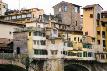 travel to Italy - houses on medieval Ponte Vecchio ( Old Bridge) in Florence city in winter day