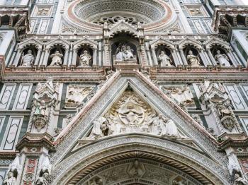 travel to Italy - decoration of facade of Santa Maria del Fiore Duomo Cathedral in Florence city in winter day