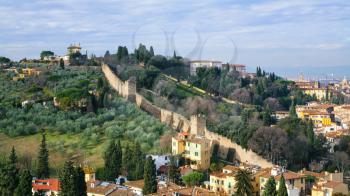 travel to Italy - above view of gardens and wall of Giardino Bardini from Piazzale Michelangelo in Florence city in sunny winter day