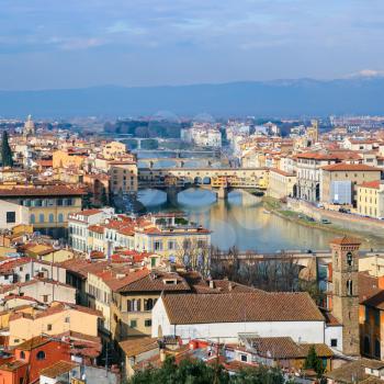 travel to Italy - above view Arno River in Florence town from Piazzale Michelangelo in sunny winter day
