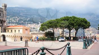 MONACO CITY, MONACO - JULY 6, 2008: tourists on Boulevard Louis II in Monaco city. Principality of Monaco is sovereign city-state and country located on the French Riviera