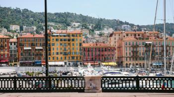 NICE, FRANCE - JULY 11, 2008: view of old port from quay in Nice city. Nice is located in French Riviera , it is the capital of Alpes-Maritimes departement located in the French Riviera