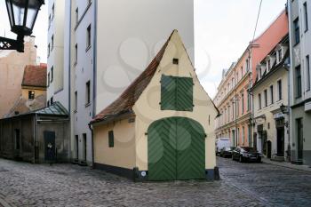 RIGA, LATVIA - SEPTEMBER 21, 2008: crossroad of Palasta and Maza Skolas medieval streets in Old Riga town in autumn. Riga city historical centre is a UNESCO World Heritage Site